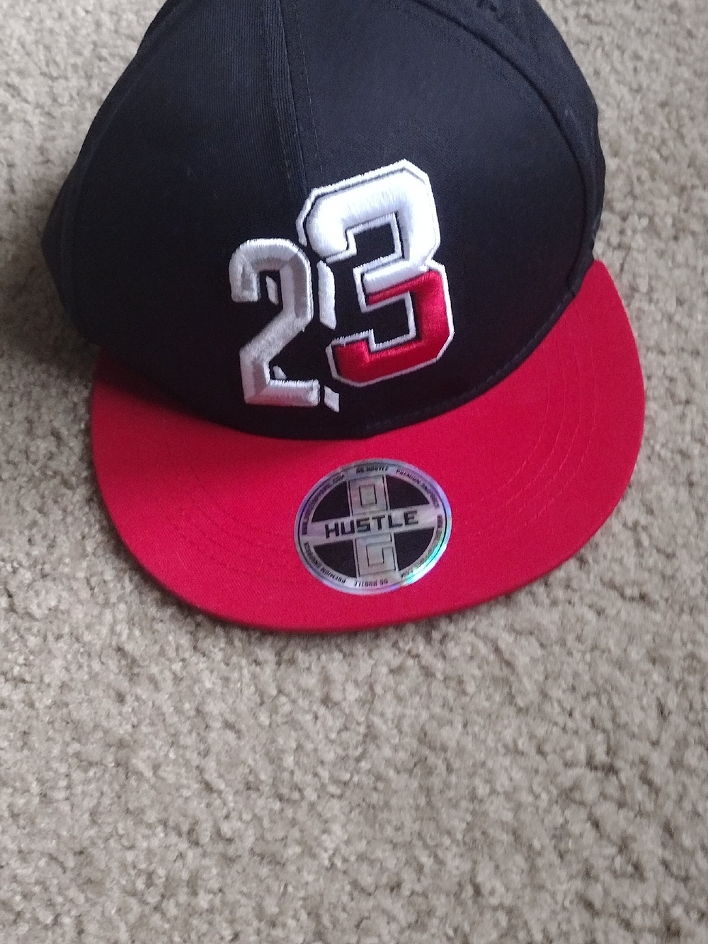 Hustler Hollywood Black $10.   Snapback Hat with Logo Patch